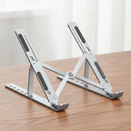 Support Laptop Ergonomique Aluminium – Pliable & Réglable